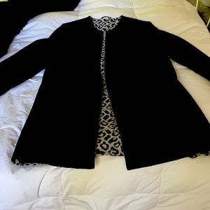 Reversible coat with detachable faux fur collar.